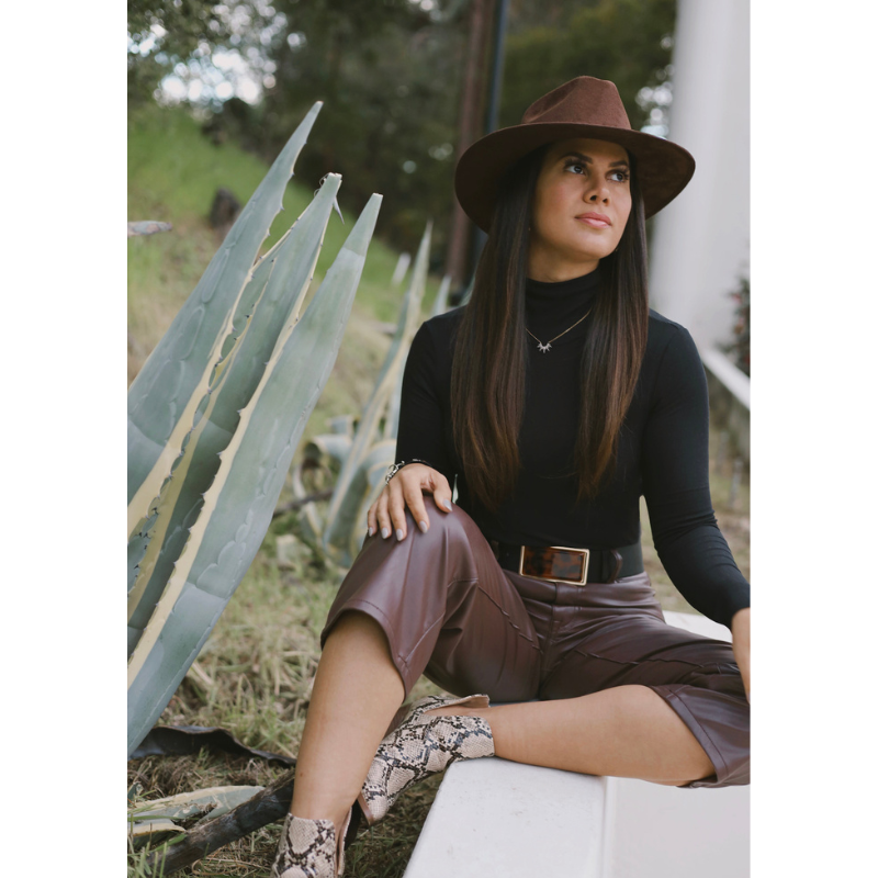 Glendale, CA, Model wearing an Indiana Hat in Color Brown.